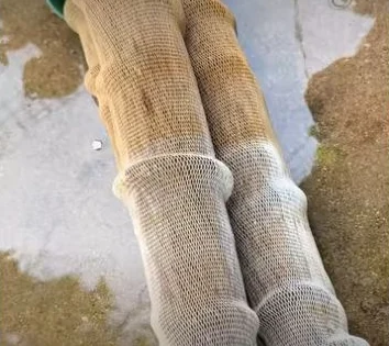 A close-up of deposits on a used filter.